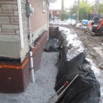 French drain installation in Montreal to protect home foundation from water damage
