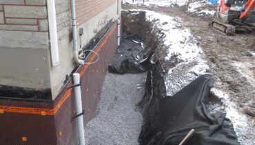 French drain installation in Montreal to protect home foundation from water damage